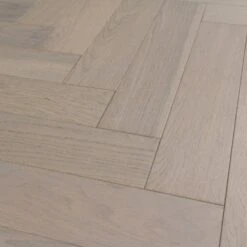 Liberty Floors Pebble Grey Oak - Herringbone Parquet 14mm Engineered Real Wood Flooring (219386) -Cheap Unika Store pebble grey oak herringbone parquet 14mm engineered real wood flooring 219386 p85834 201394 image