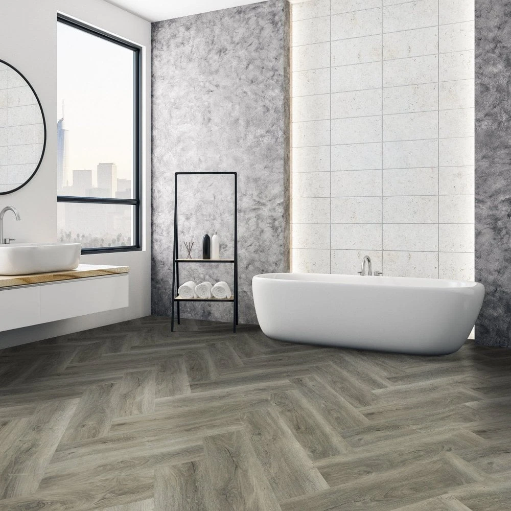 Liberty Floors Signature Grey - Lifestyle SPC Herringbone 5.5mm Rigid Core Vinyl Flooring (324720) 1 Liberty Floors Signature Grey - Lifestyle SPC Herringbone 5.5mm Rigid Core Vinyl Flooring (324720)